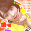 100x100 icon of takase kurumi from beyooooonds. she's wearing her outfit for "vitamin ME" and there are various cartoon fruit stickers edited around the icon.